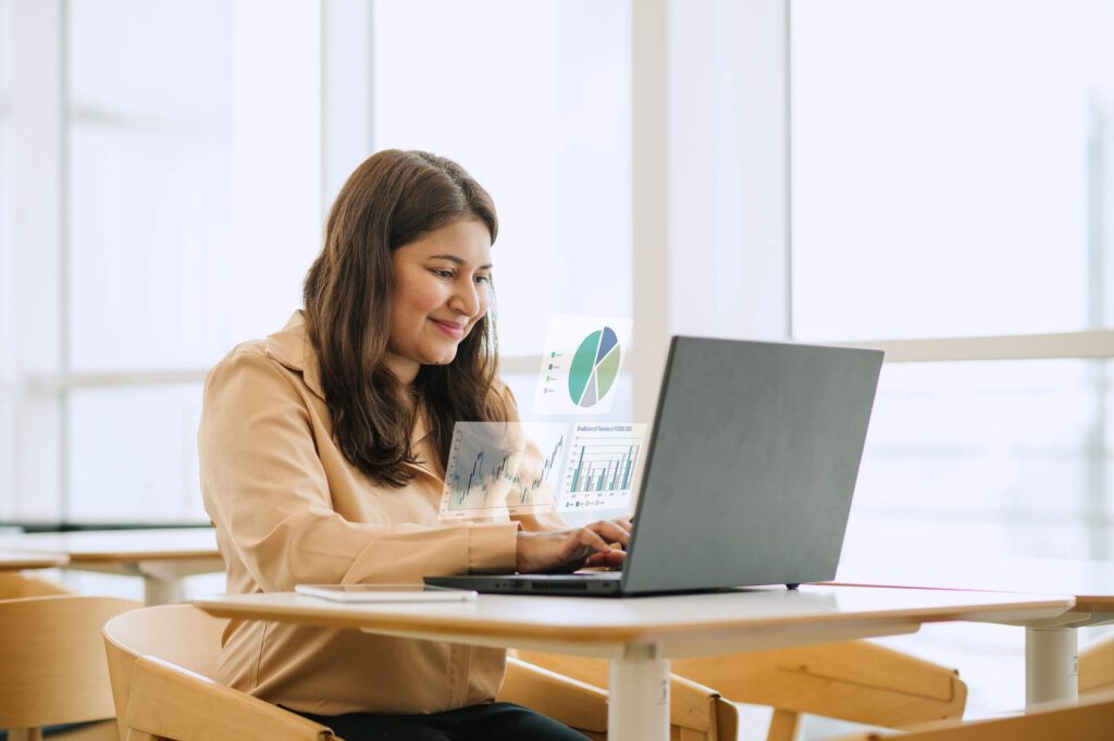A fleet owner reviews the data from her drivers’ fuel card transactions.