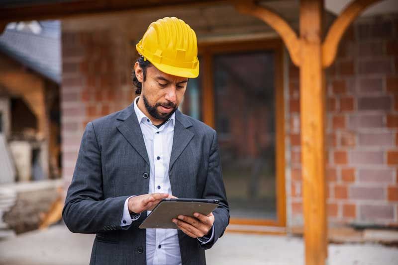 A business owner is able to view limits on his fleet card from a tablet away from his desk while on the worksite.